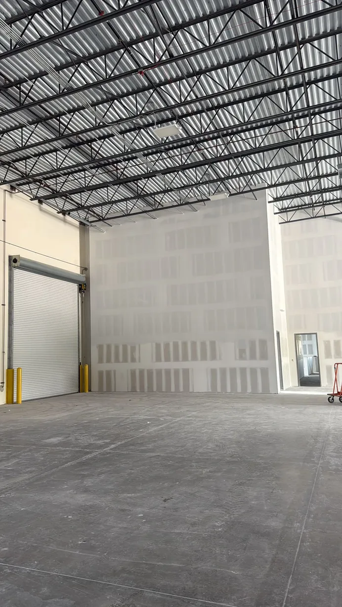 Full-height board on a warehouse buildout